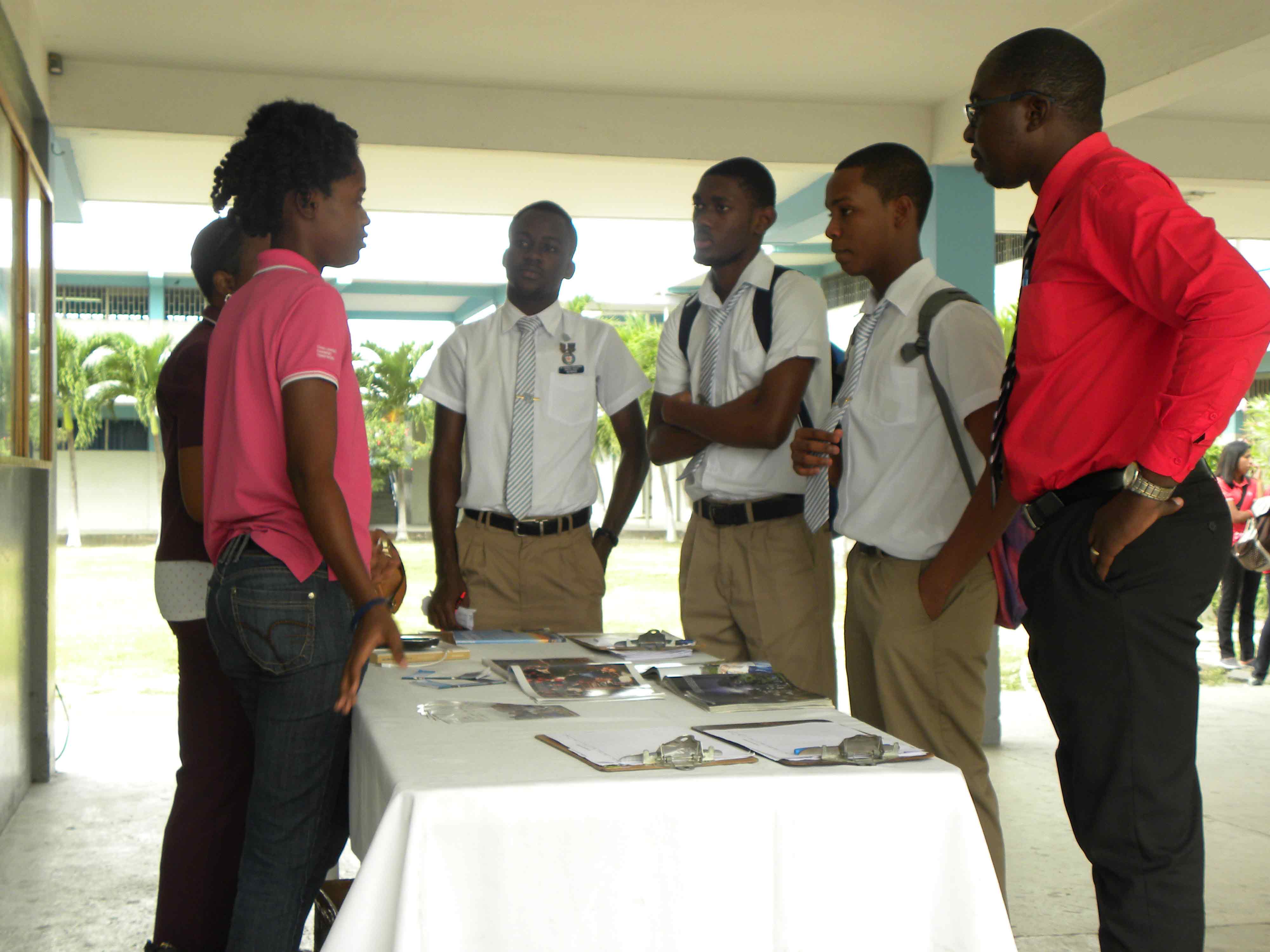 Students flock the promotion table to learn how to join the IYF